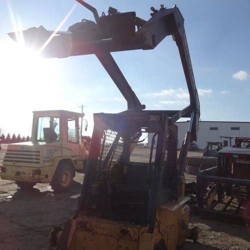 Used New Holland LX885 Skid Steer Loader parts.
