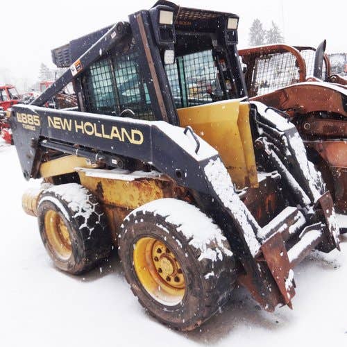 Used New Holland LX885 Skid Steer Loader parts.