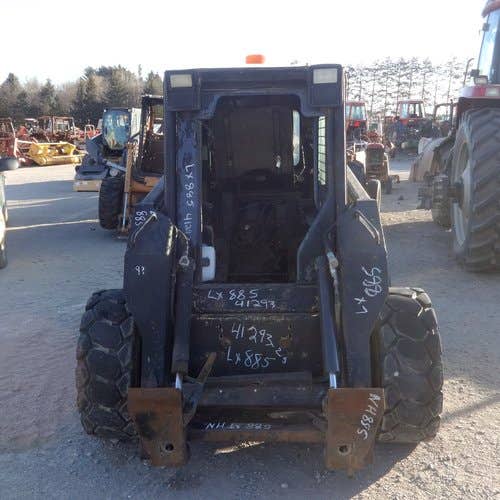 Used New Holland LX885 Skid Steer Loader parts.