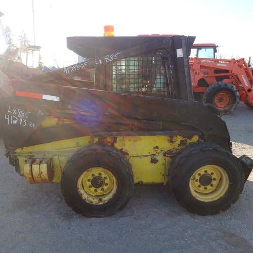 Used New Holland LX885 Skid Steer Loader parts.