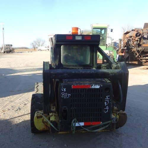 Used New Holland LX885 Skid Steer Loader parts.