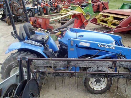 Used New Holland TC33 Tractor parts.