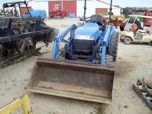 Used New Holland TC33 Tractor parts.