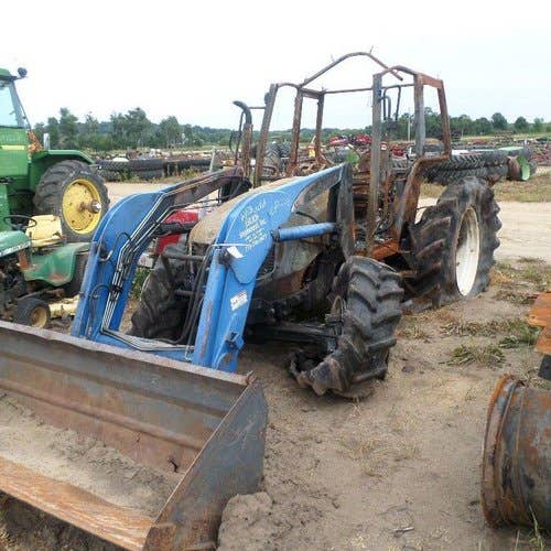 2005 Used New Holland TL100A Tractor parts.