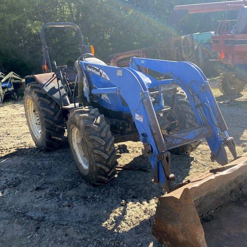 Used New Holland TL100A Tractor parts.