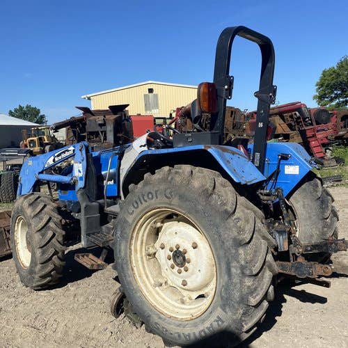 Used New Holland TL100A Tractor parts.