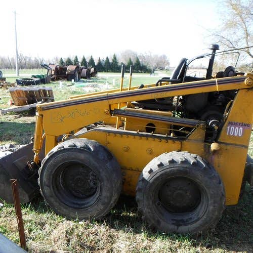 Used Owatonna 1000 Skid Steer Loader parts.