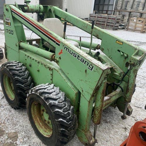 Used Owatonna 1700 Skid Steer Loader parts.