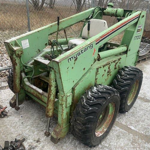 Used Owatonna 1700 Skid Steer Loader parts.