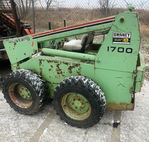 Used Owatonna 1700 Skid Steer Loader parts.