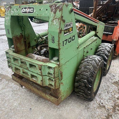 Used Owatonna 1700 Skid Steer Loader parts.