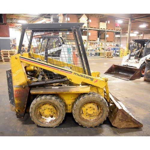 Used Owatonna 320 Skid Steer Loader parts.