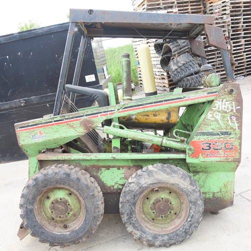 Used Owatonna 330 Skid Steer Loader parts.