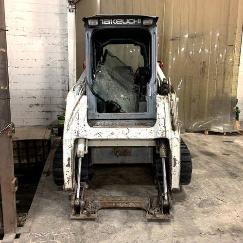 Used Takeuchi TL140 Skid Steer Loader parts.